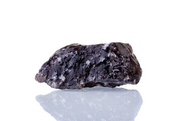 macro mineral stone Obsidian on a white background