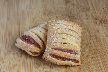 Tasty cookies with apple jam closeup.
