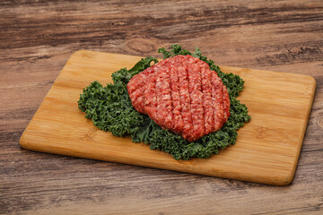 Raw beef burger cutlet for cooking