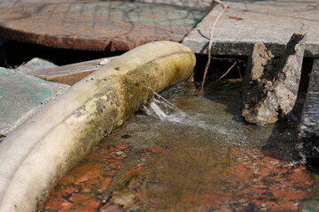 Leakage in the connection of the water pumping pipes. Breakthrough of the water pump sleeve.