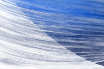 Blue flowing liquid waves abstract motion blurred background.