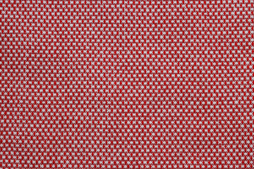 Close-up of the red and white  textile texture, background and wallpaper. 