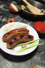 fried sausages with sauce