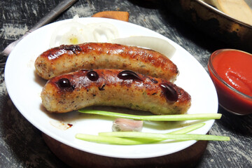 fried sausages with sauce