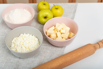 Ingredients for recipe an apple roll. Apple pie making process