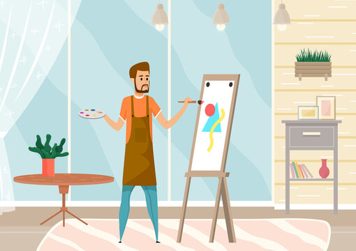 Bearded man drawing picture holding paint brush standing near easel in home interior or art studio