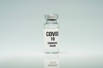 Covid 19 coronavirus vaccine in glass flask for immunity