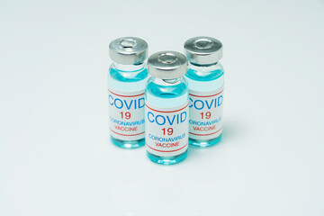 Covid 19 coronavirus vaccine in glass flask for immunity