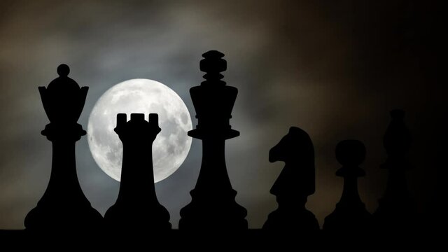 Chess Board By Night Time Lapse with Full Moon and silhouette of Chess Figure. Strategy, Thinking and Decision Concept