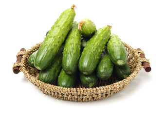 Green cucumber on the white background