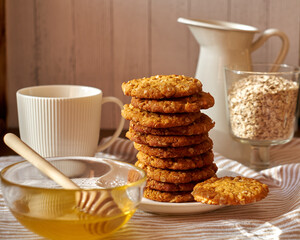Honey oatmeal chip cookies. Side view. Milk.