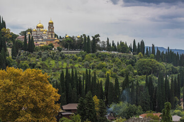 Fototapeta na wymiar New Athos, Republic of Abkhazia, 09.21.2019. New Athos Simono-Kananite monastery located at the foot of Mount Athos in Abkhazia