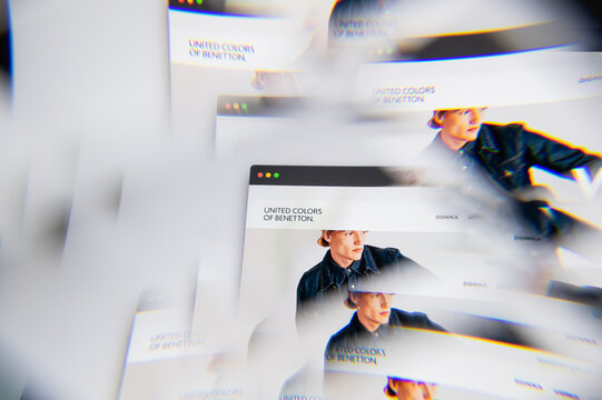 Milan, Italy - APRIL 10, 2021: benetton logo on laptop screen seen through an optical prism. Illustrative editorial image from benetton website.
