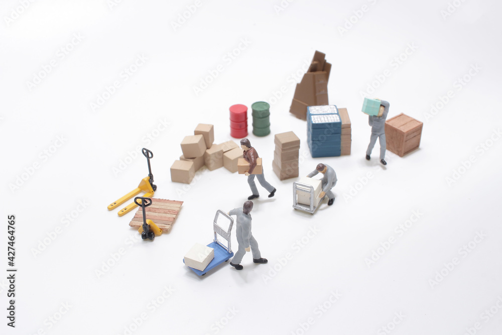 Wall mural the mini worker figure move the products