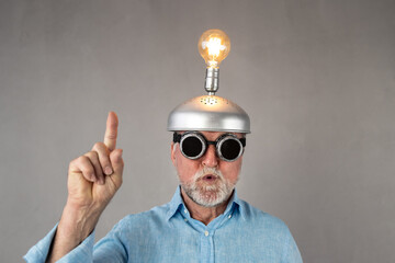 Senior businessman have a bright idea