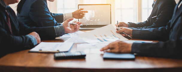 Business people brainstorm meetings to discuss and analyze business strategies and planning. Meeting marketing plans to increase the quality and sales volume.