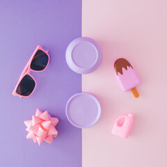 Women's cosmetics for summer. Pink and purple accessory color. Pink sunglasses and ice cream.