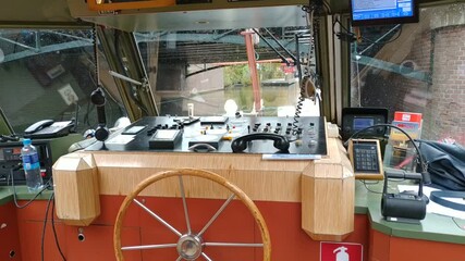 Amsterdam, Netherlands - November 01, 2019: view on the city architecture from channel boat at the autumn weather