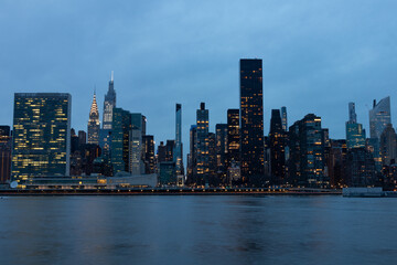 Fototapeta na wymiar Evening Midtown Manhattan Skyline along the East River in New York City