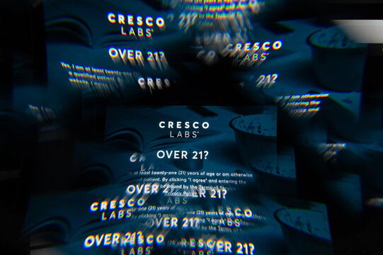 Milan, Italy - APRIL 10, 2021: Cresco Labs logo on laptop screen seen through an optical prism. Illustrative editorial image from Cresco Labs website.