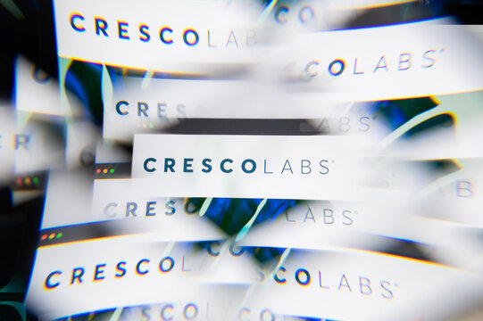Milan, Italy - APRIL 10, 2021: Cresco Labs logo on laptop screen seen through an optical prism. Illustrative editorial image from Cresco Labs website.