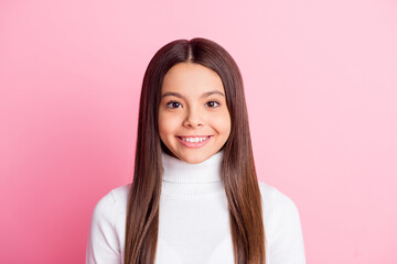 Photo of optimistic nice brunette girl wear white sweater isolated on pastel pink color background