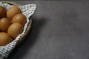 There are some chicken eggs on the plate perfect for cooking