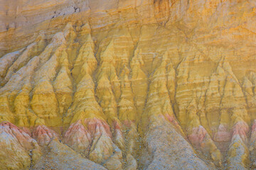 White and colored sedimentation in the Provencal Colorado in Rustrel in the region of Provence, France