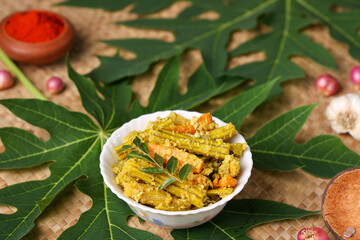 Aviyal  mixed vegetable curry with grated coconut Kerala, Tamil Nadu in South India Sri Lanka. Indian vegetarian curry festival food Onam Sadhya, Vishu , Pongal
