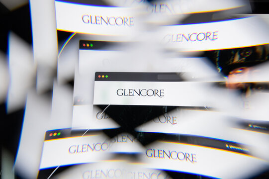 Milan, Italy - APRIL 10, 2021: Glencore International logo on laptop screen seen through an optical prism. Illustrative editorial image from Glencore International website.