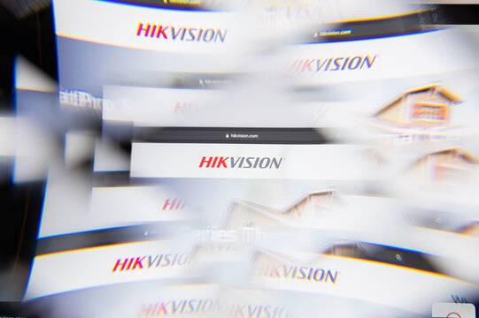 Milan, Italy - APRIL 10, 2021: Hikvision logo on laptop screen seen through an optical prism. Illustrative editorial image from Hikvision website.