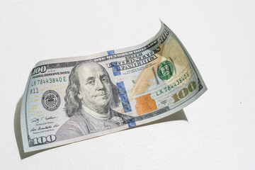 100 Dollars bill and portrait Benjamin Franklin on USA money banknote