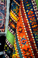 carpets for sale on a market, design patterns of a rug