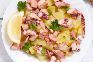 Octopus and potato salad, traditional mediterranean food