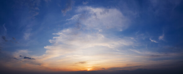 Beautiful blue sky with clouds at sunrise.