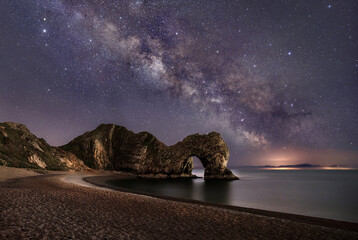 The Milky Way Over Durdle Door In Dorset - obrazy, fototapety, plakaty