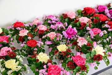 Closeup of Fresh flowers in a vase at the church bangkok, thailand.