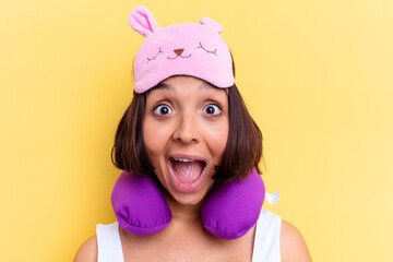 Young mixed race woman with a neck rest isolated