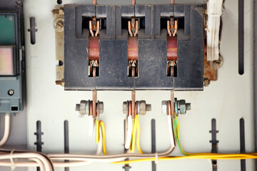 The old manual switch of disconnecting the voltage in the transformer box close-up.