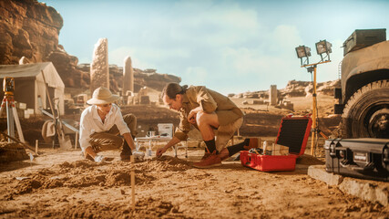 Archaeological Digging Site: Two Great Archeologists Work on Excavation Site, Cleaning Cultural...