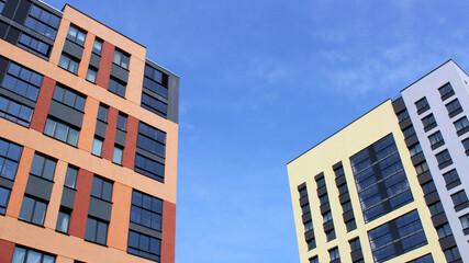 new two houses with a blue sky