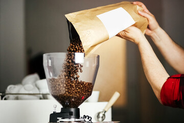 Bartender making coffee barista in a cafe