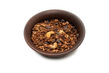 Chocolate granola cereal with nuts in a bowl background.