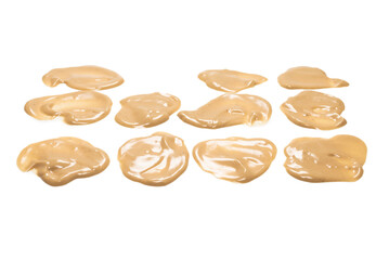 Mushroom sauce splashes isolated on white background.