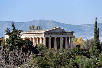 Fototapeta na wymiar Athens, Attica, Greece. The Temple of Hephaestus or Hephaisteion (also Hephesteum) is an ancient greek temple located at the archaeological site of Agora of Athens in Theseion district. Sunny day