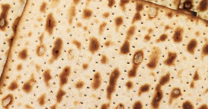Matzah, unleavened bread rotate. Matzo super slow motion.