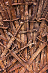 rusty sword, a background of a large number of vintage, deformed swords, erosion of blades that once served as weapons