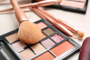 Makeup brushes and cosmetics, closeup