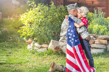 Happy reunion of soldier with family outdoors