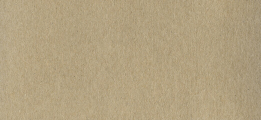 Clean brown cardboard paper background texture. Horizontal banner